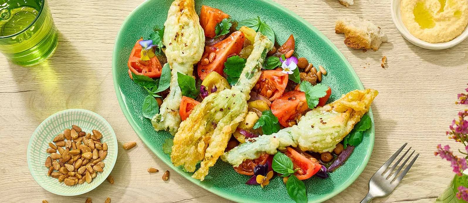 Flores de curgete com tomates teriyaki