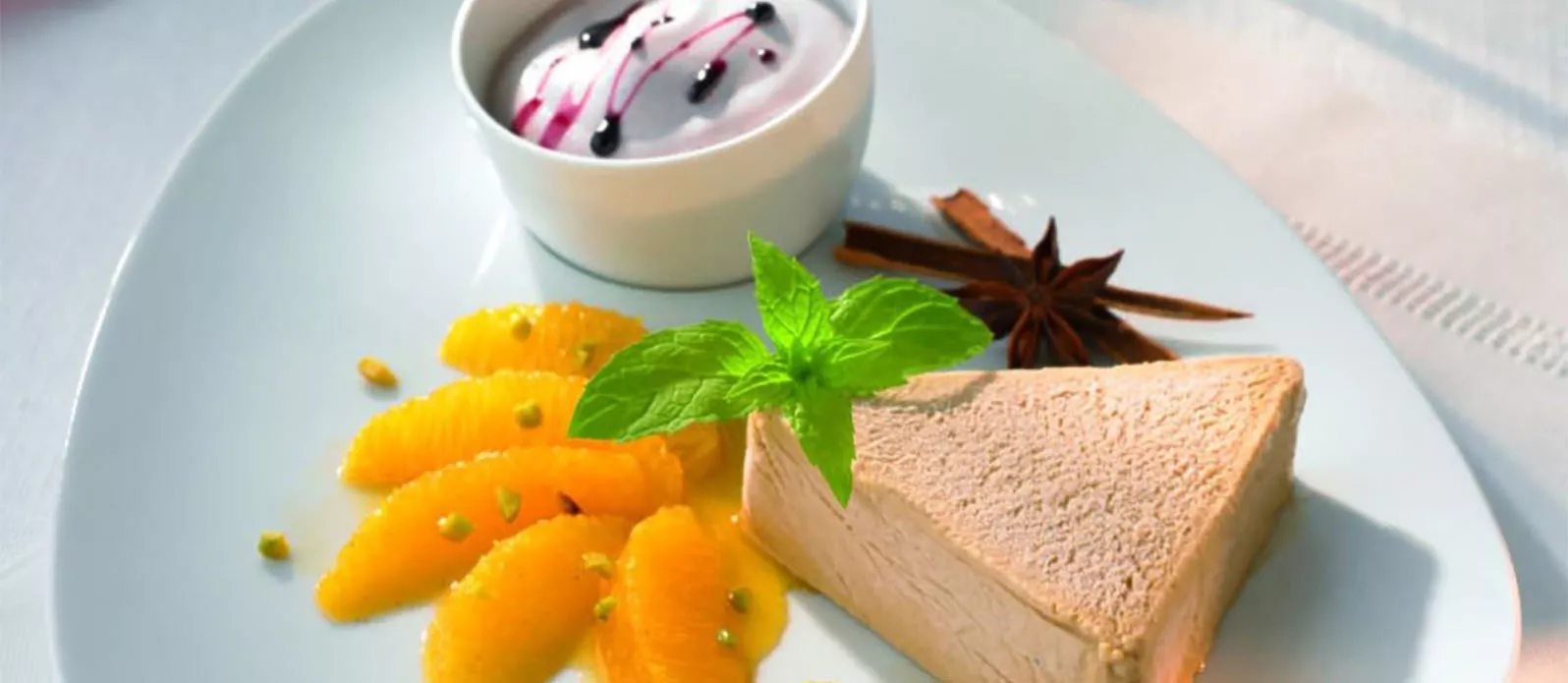 Parfait de mel e soja com laranjas perfumadas e zabaione de vinho quente