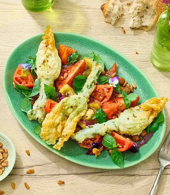 Flores de curgete com tomates teriyaki