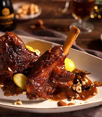 Pernas de borrego assadas com alperces