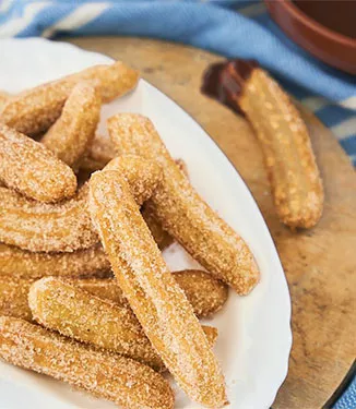 Churros com molho de chocolate